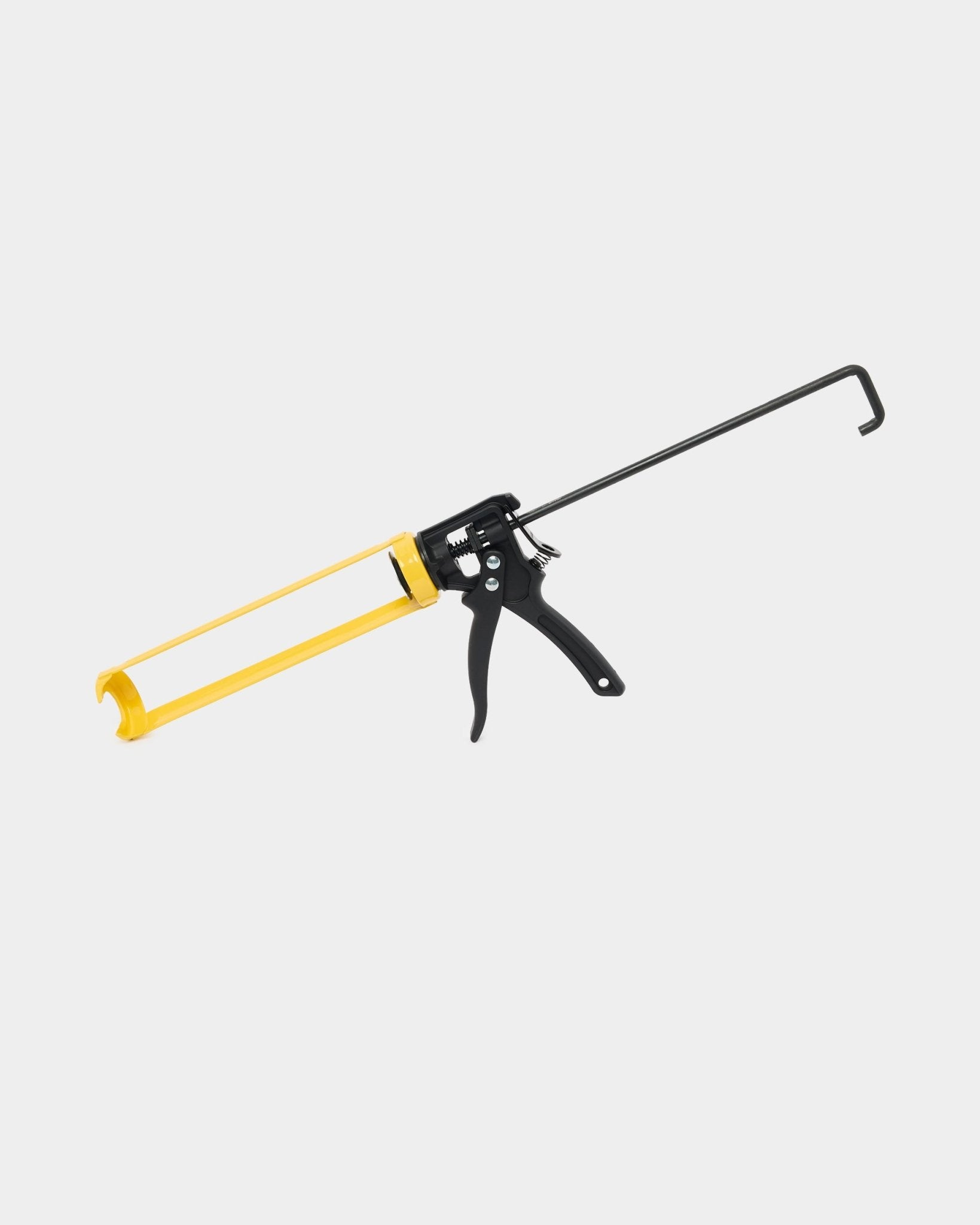 WoodUpp Grout Gun (290 ml) para instalação de Akupanel, com pega e gatilho metálicos amarelos e black, usada para aplicar cola de montagem em painéis acústicos.