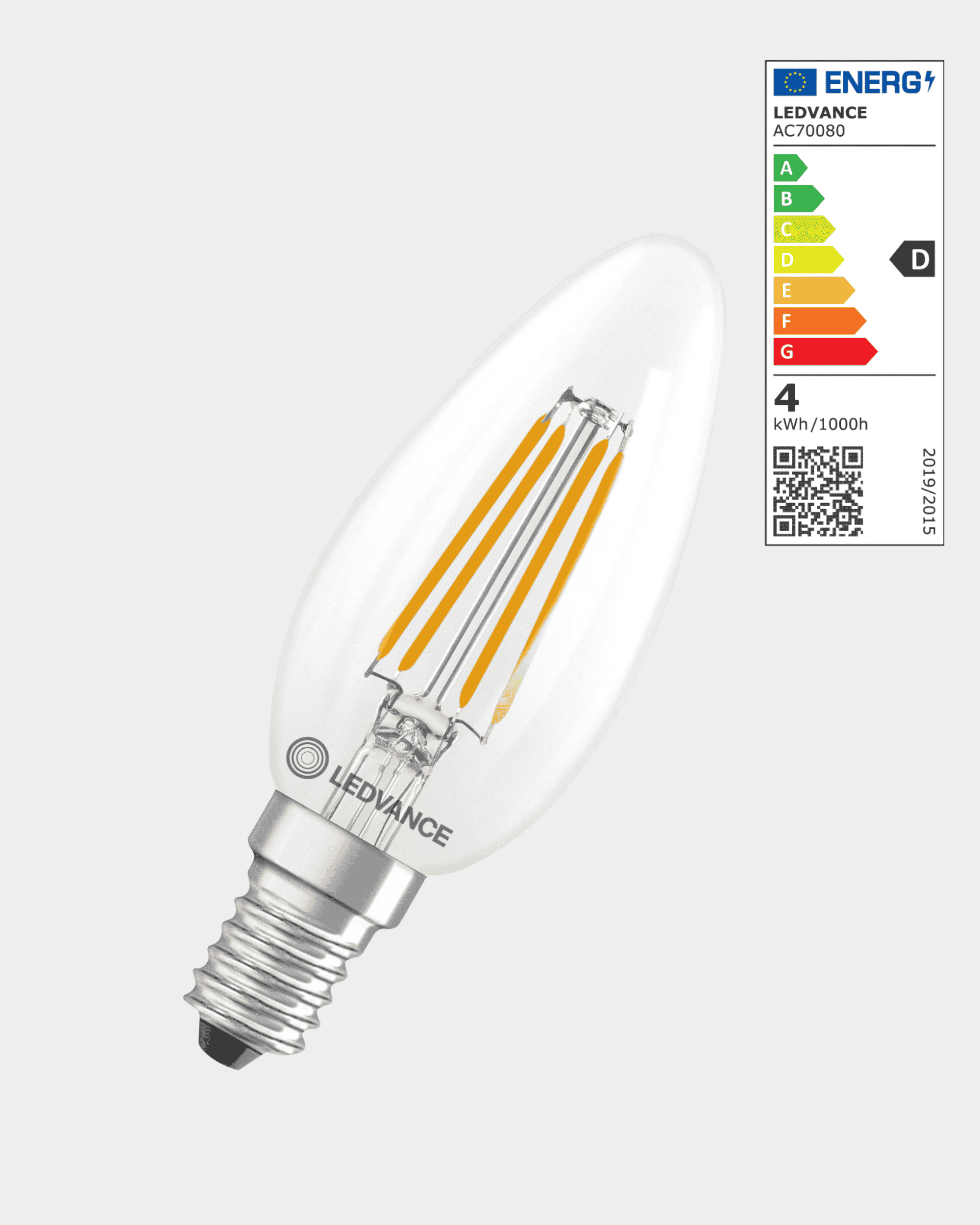 Lâmpada WoodUpp E14 de 3,4 W tipo vela, com filamentos visíveis, 470 lúmenes de potência luminosa e etiqueta energética D apresentada no canto superior direito.